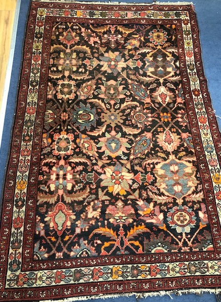 A red ground Hamadan rug 1966 x 133cm